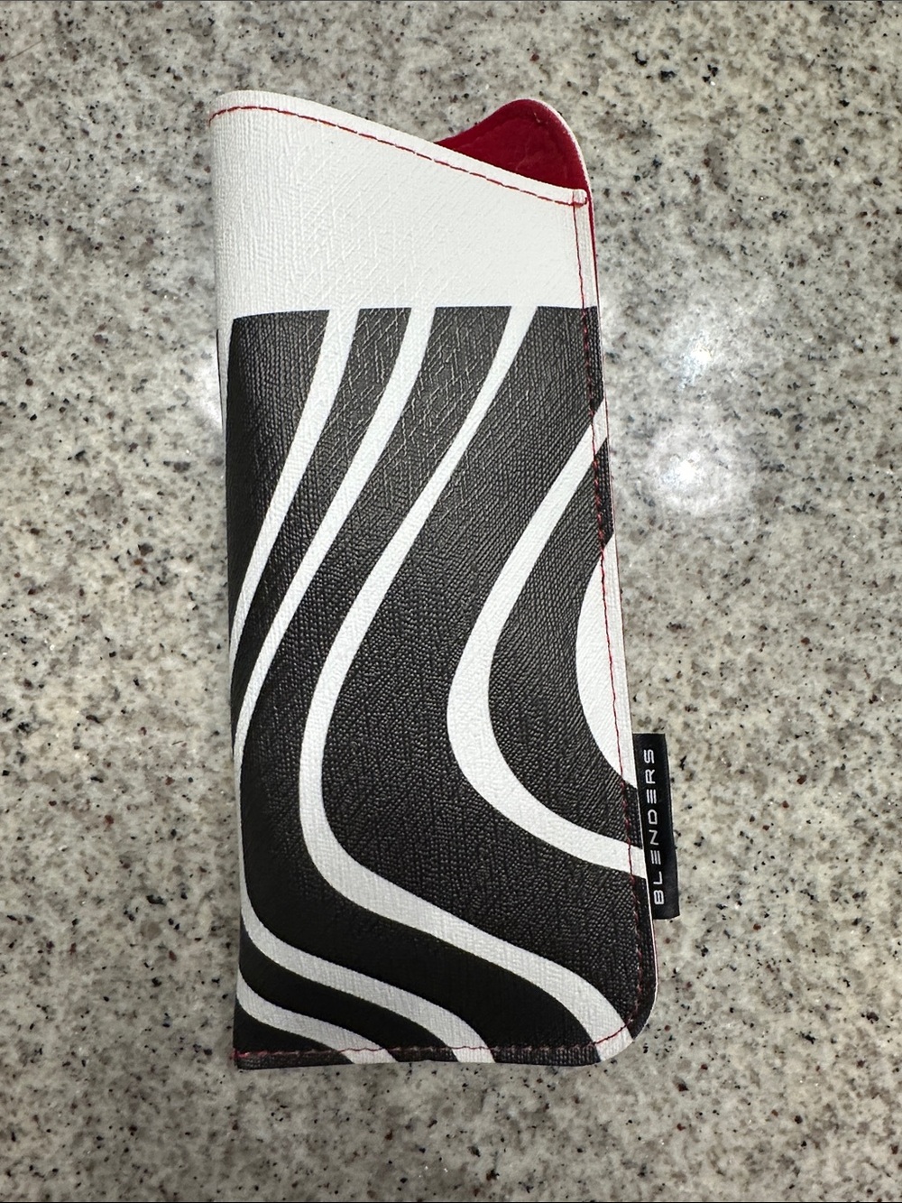 Black & white swirl Sunglass Case with red velvet interior